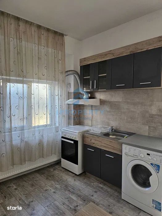 Inchiriere Casa 2 camere +curte  zona Rahova