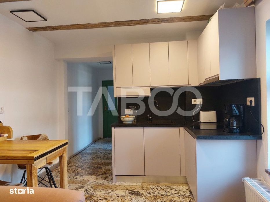 Apartament de vanzare 105 mp 3 camere curte 340 mp in acte Cisnadie