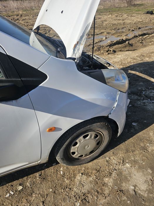 Dezmembrez  Chevrolet spark 2012 piese motor cutie uși haion aripi