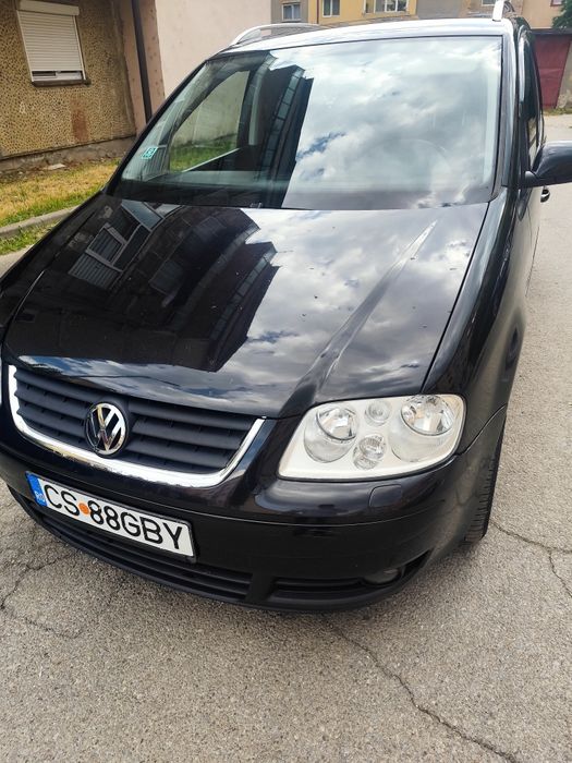 Volkswagen Touran 2.0 diesel, 5 locuri