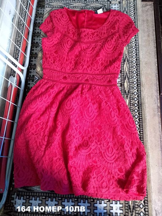 Дрехи за момиче якета рокли сака гащеризон 164 размер