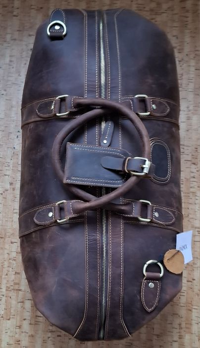 Коженая сумка DAINEX