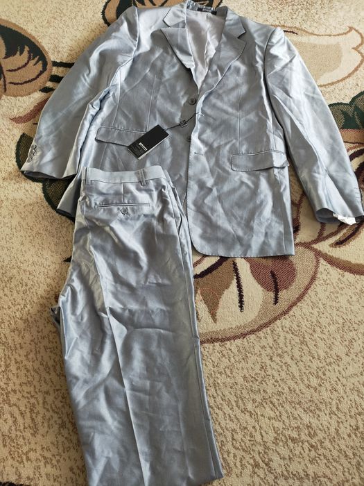 Продам новый мужской костюм