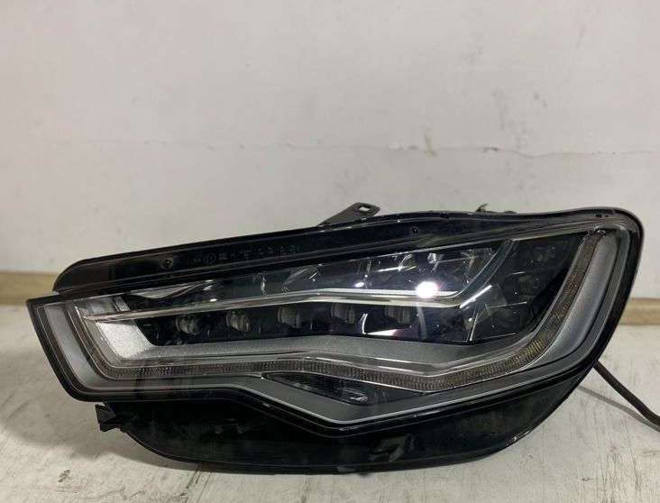 Привозные фары на Audi A6C7