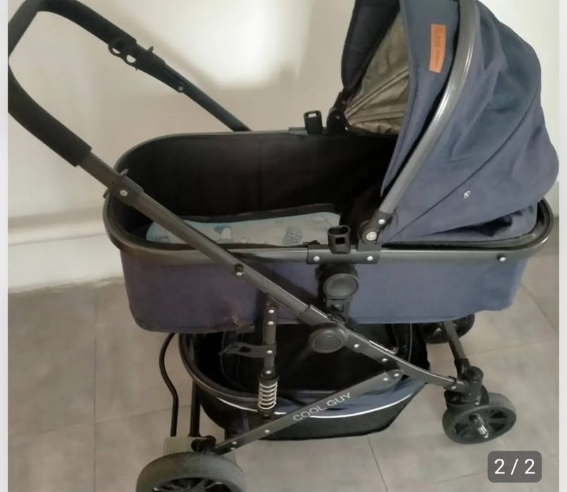 Коляска темно синего цвета