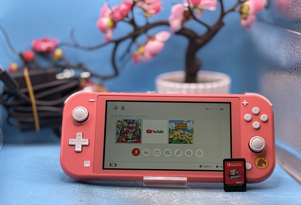 Nintendo Switch Lite (Animal Crossing Edition) + Super Mario Odyssey