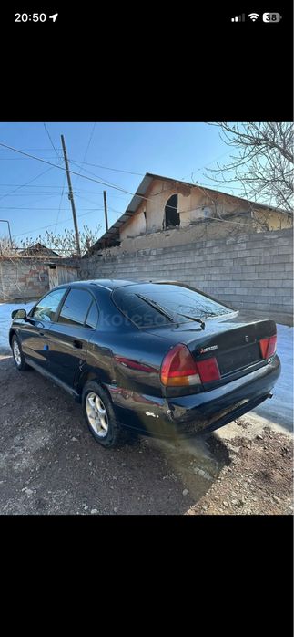 Митсубиши каризма