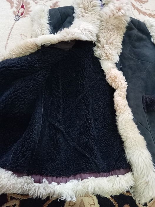 Тёплая безрукавка