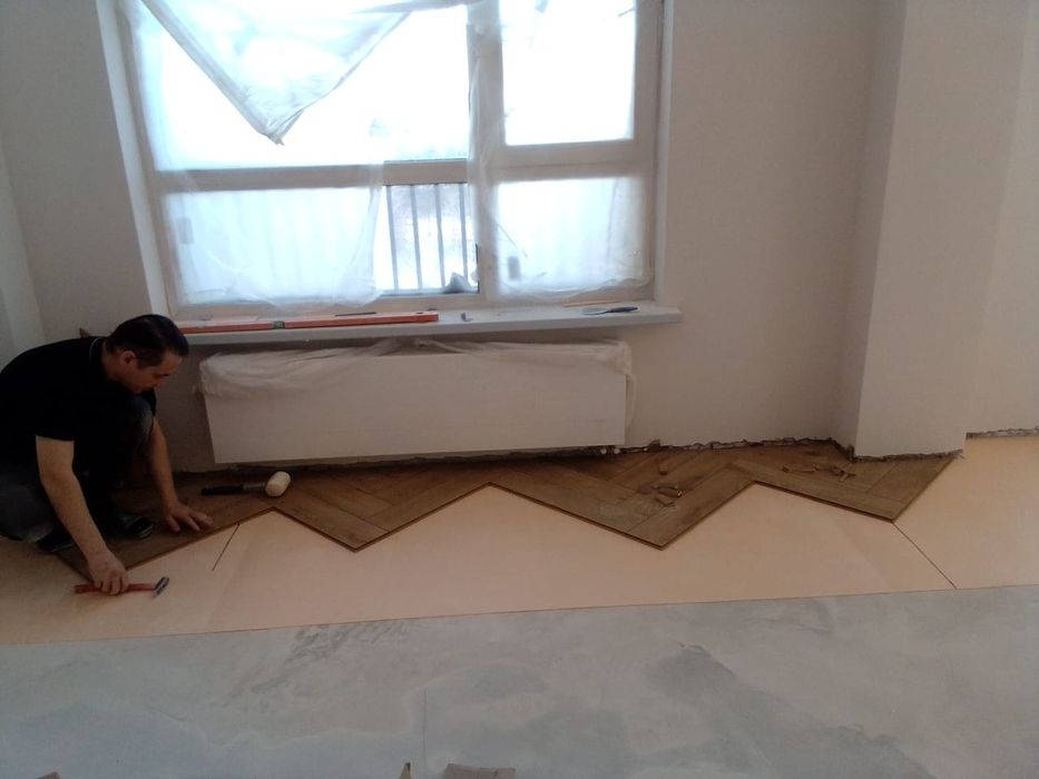 Укладка ламината от 1200 тг паркета,,елочкой.Установка дверей.Астана ...
