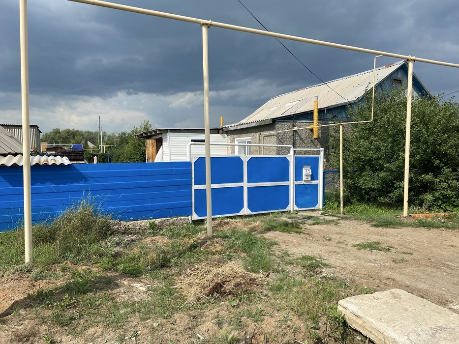 Четырехкомнатный дом в черте города