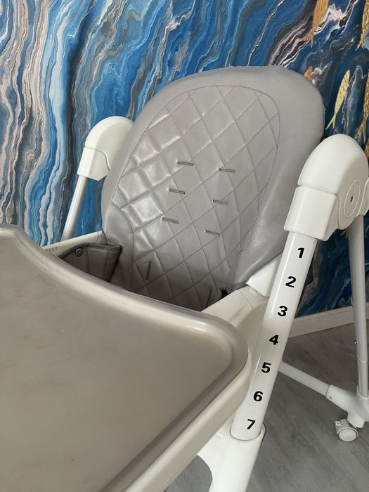 Продам детский стульчик Tomix