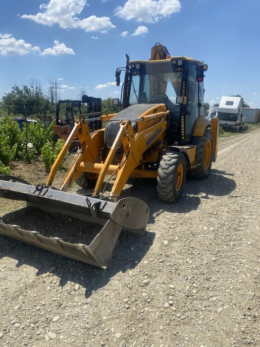 Vând buldoexcavator Komatzu