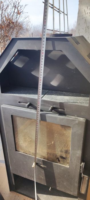 Продам печь-камин вместе с трубой