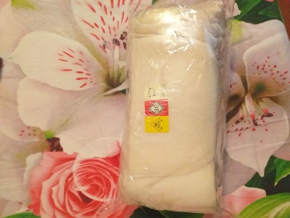 Упаковка подплечиков.