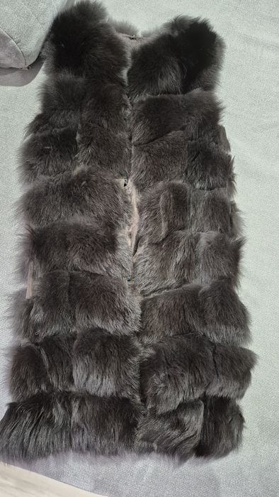 Продам жилетку меховую