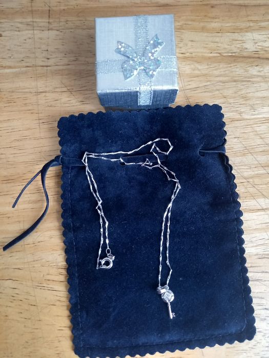 Продам  цепочку с кулоном