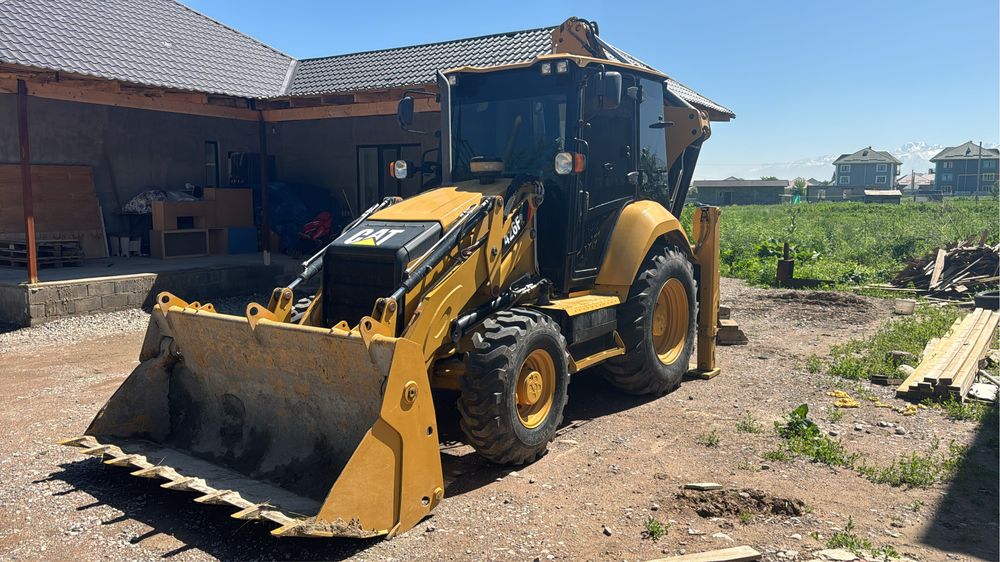 Экскаватор Пагрузчик Кат