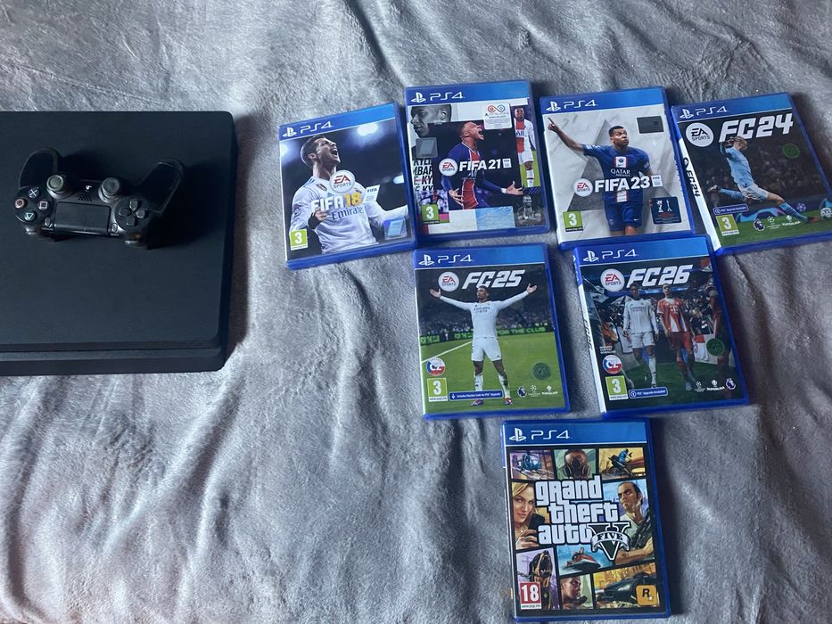 PS4 Slim 500 GB + manetă originală+ 6 jocuri