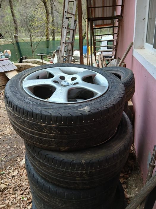 Vând roți de Ford (cauciucuri de vara)