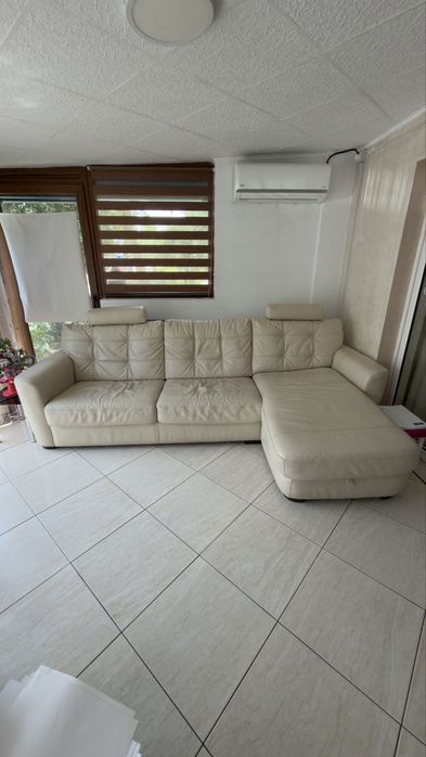 Colțar extensibil din piele cu ladă depozitare – Stare excelentă