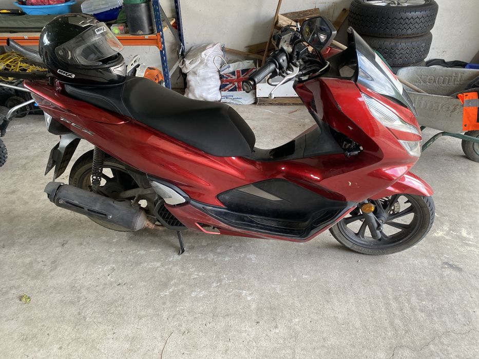 Scuter 125 motor conditie super o dau la vanzare ca nu o mai folosesc