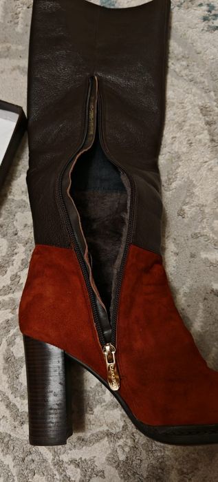 Продам новые сапоги