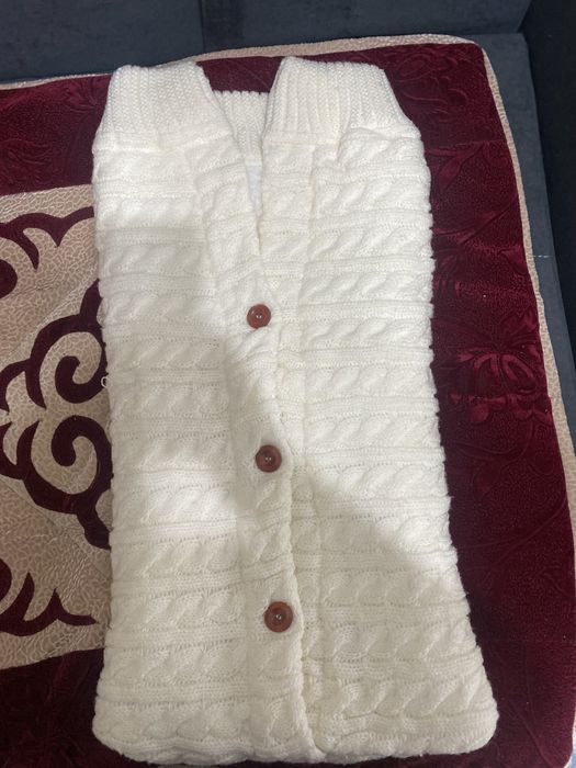 Вязаный конверт-спальник для малыша