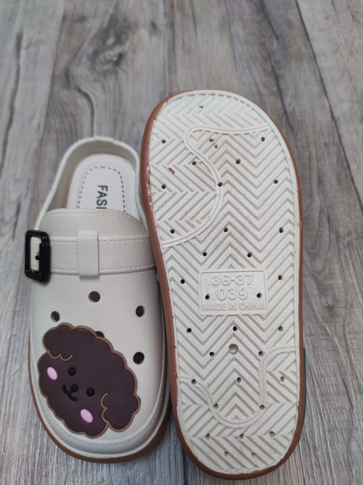 Продам новые тапочки