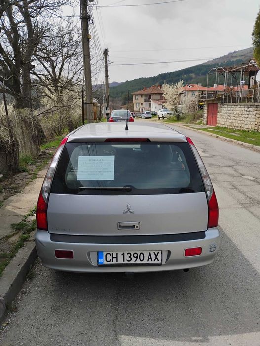 Автомобил Митсубиши Лансер