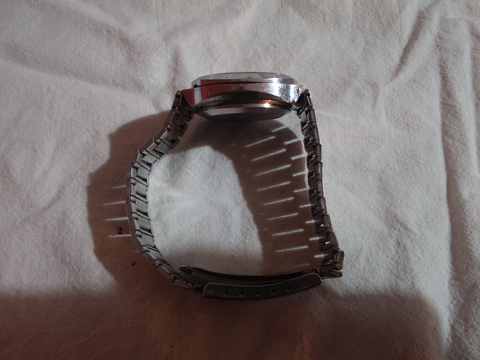 Полет, съветаки механичен часовник, с ръчно навиване.