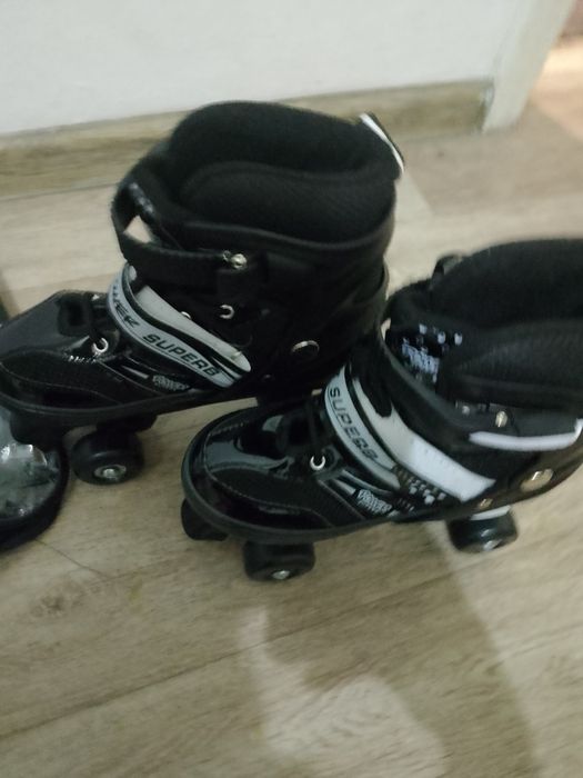 Роликовые коньки