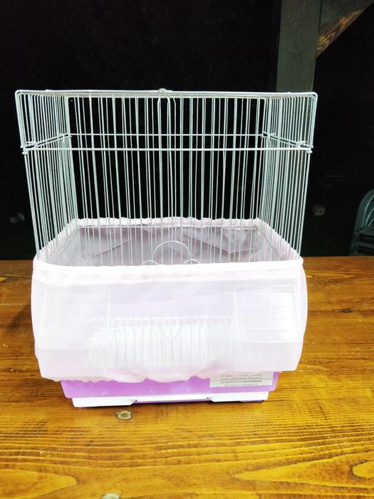 Husa colivie. Protecție împotriva mizeriei. Papagali, canari, cinteze