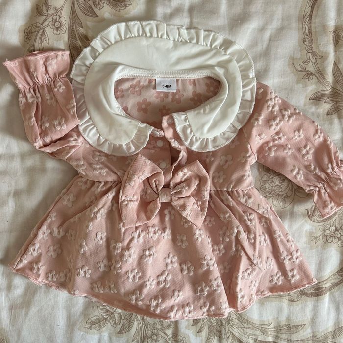 Дрехи за новородено