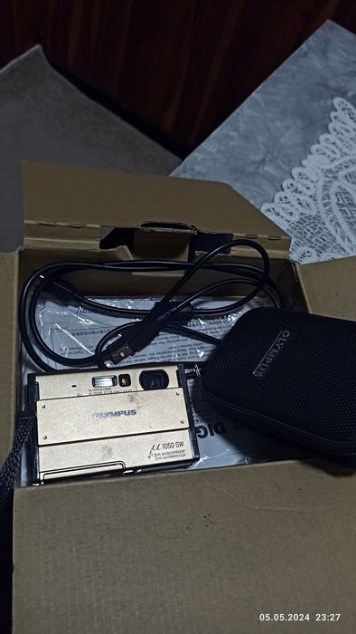 Foto vidyo tel sotladi zor aparat yengde karopka dakumenti bor