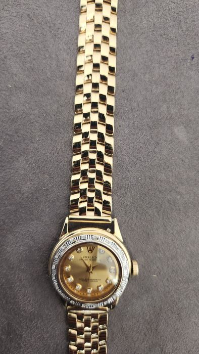 Золотые женские часы Rolex