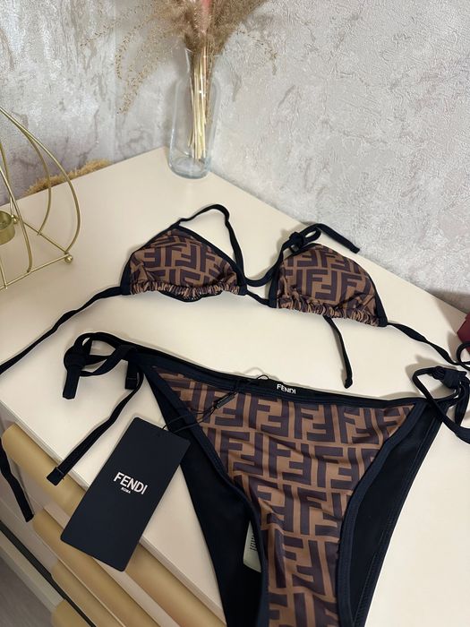 Купальники Prada