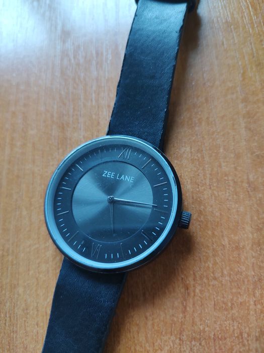 Ceas Zee Lane și ceas BMW.