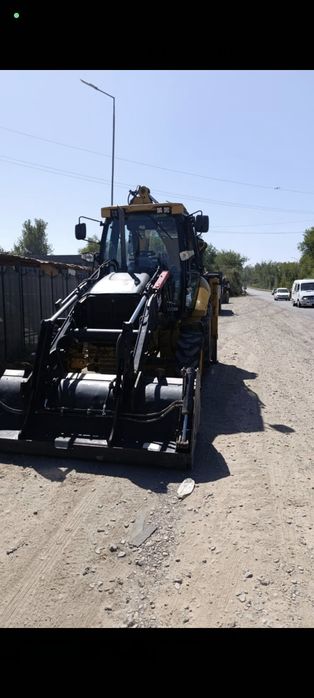Экскаватор погрузчик фронтальный телескоп трактор услуги копать ломать