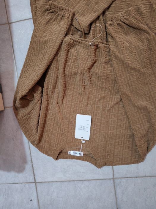 Trening  cu pantaloni evazati