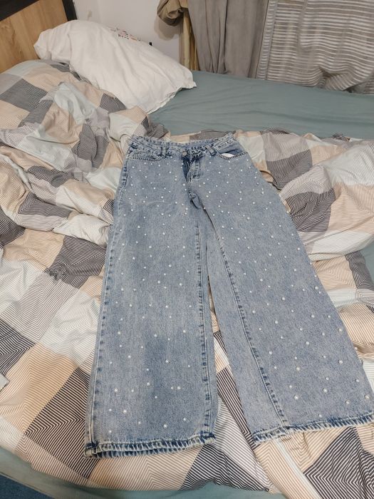 Blugi fete cumpărați din H&M