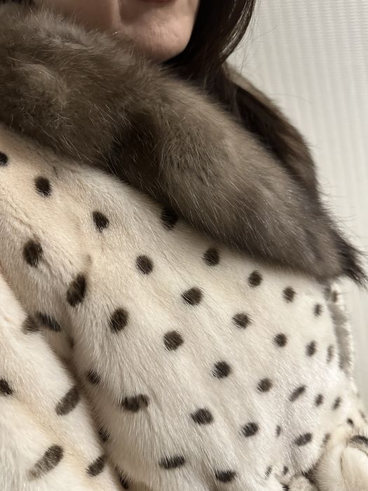 Абсолютно новая шуба.