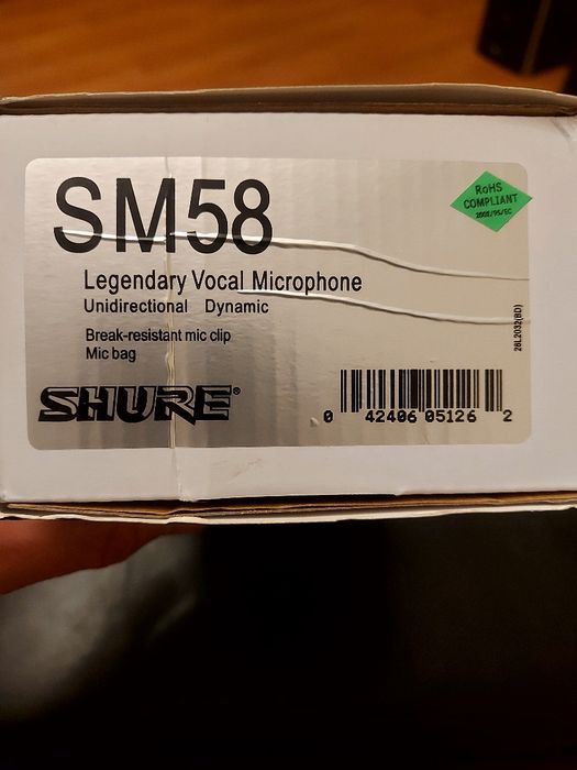 Музикален микрофон SHURE SM 58  за професионални певци и любители на м