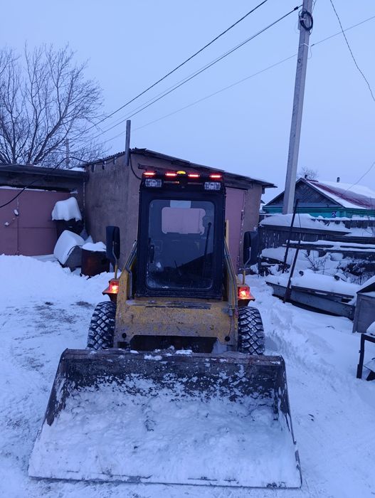 Чистка снега бобкат