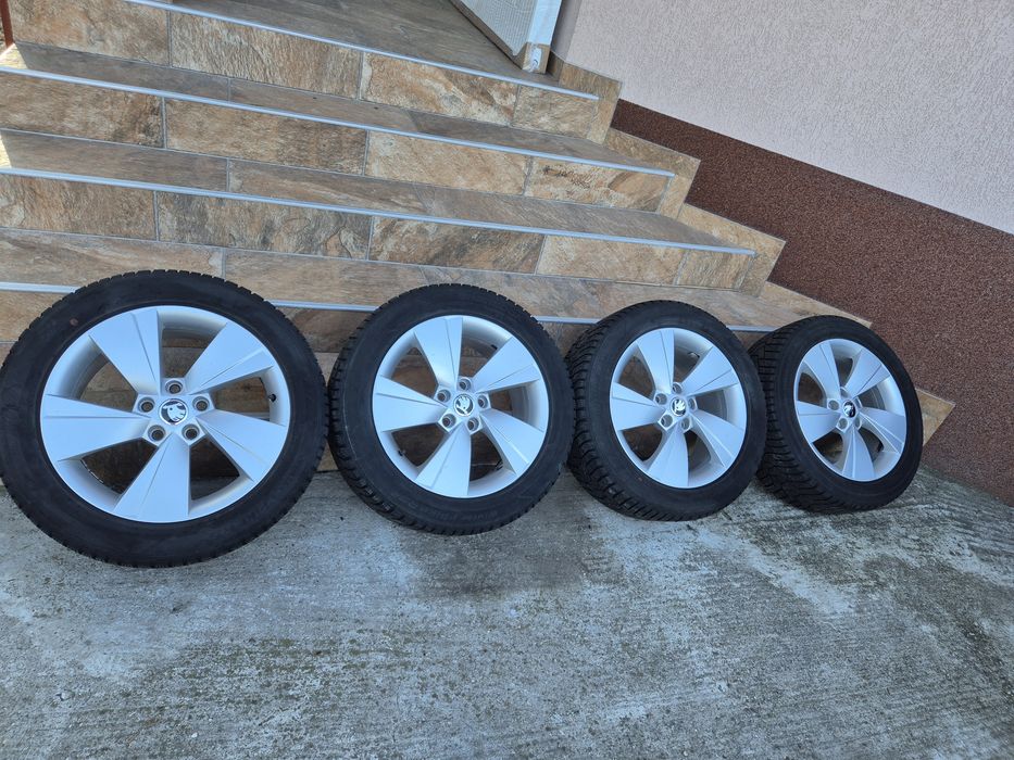 Jante Originale Skoda Octavia R17 5x112 cu anvelope iarna Hankook 215 55 R17 foarte bune