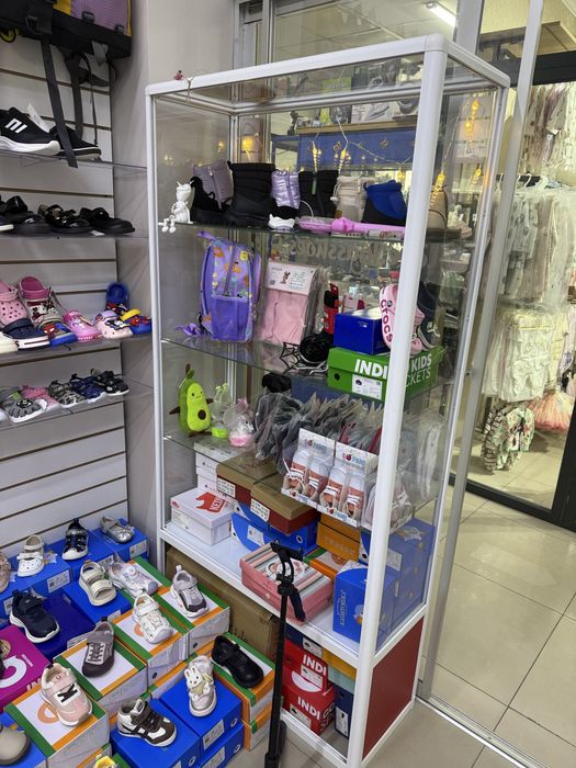 Продам б/у стеклянный стеллаж