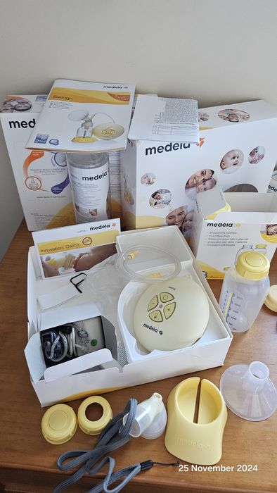 Pompă electrică Medela + biberoane
