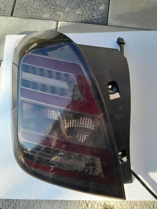 трекер-1 левый задний тонированный фонарь (китай)