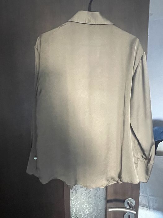 Риза Зара М