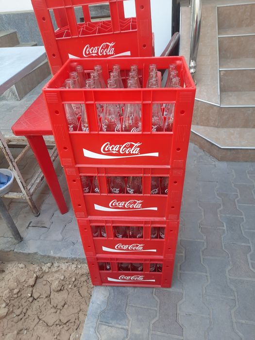 Кока-кола тара бор бутилкаси билан