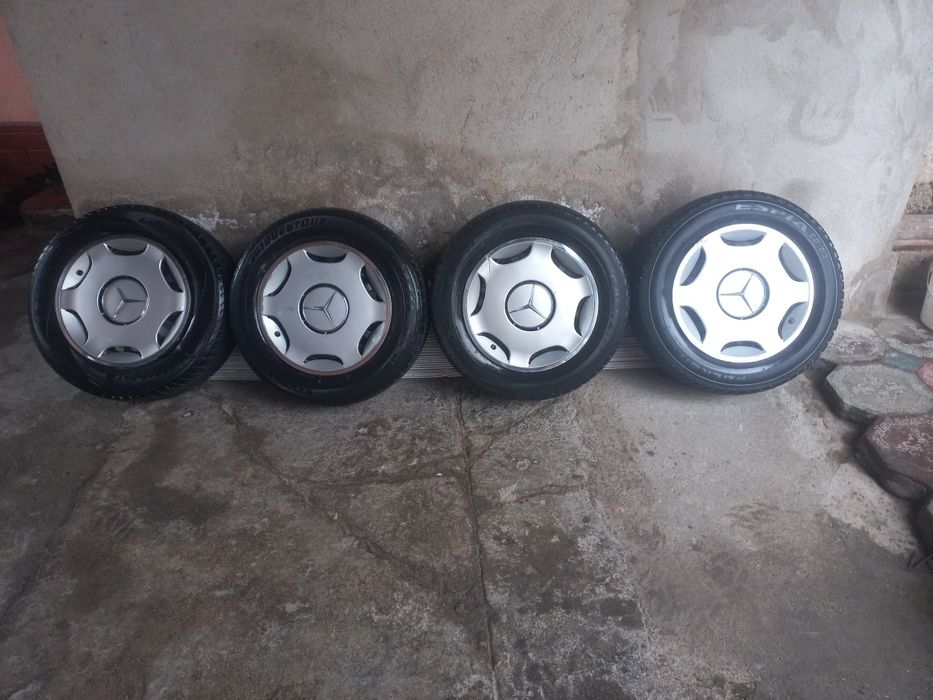 Комплект дисков с шинами и колпаками